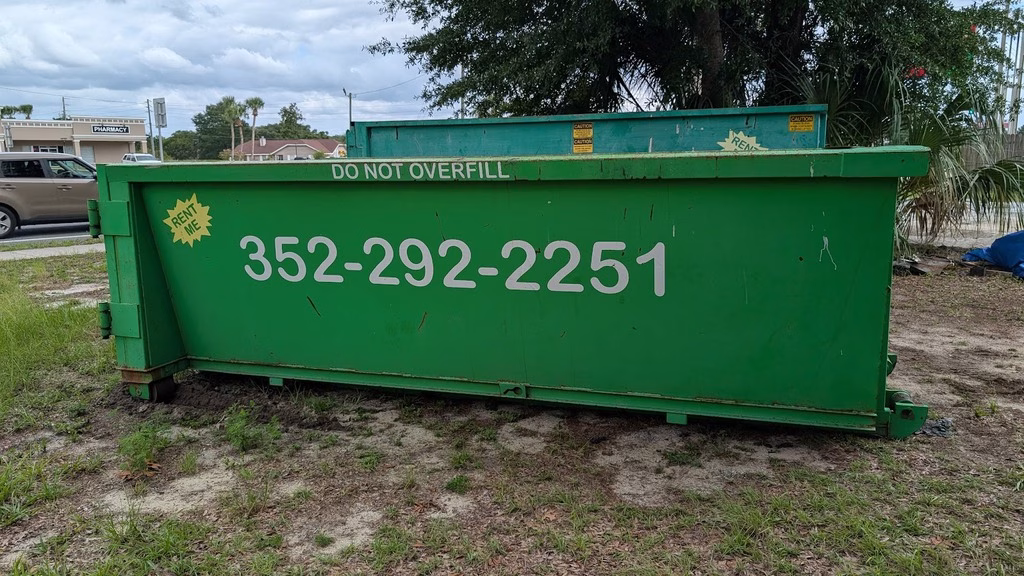 15 yard dumpster in front of 20 yard